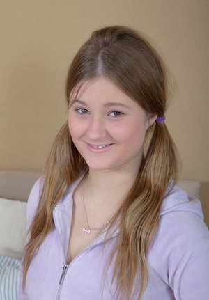 18 year old black girl Nia Nacci doffs school clothes to poses naked